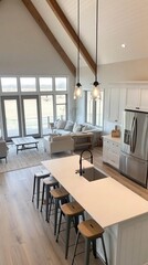 Airy open-concept living space with vaulted ceilings, exposed beams, and modern farmhouse aesthetic. Kitchen island and large windows create a bright, inviting atmosphere.