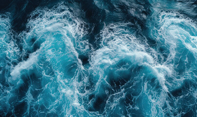 Fototapeta premium Aerial view to ocean waves. Blue water background
