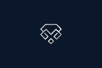 The logo features a diamond shape with the letter "M" incorporated within, creating a sleek and minimalist design
