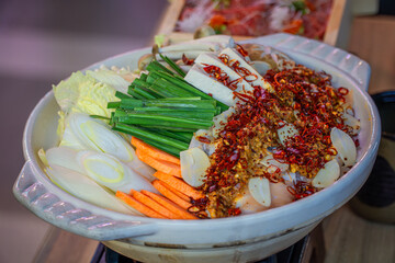 Spicy pork nabe aka with a well-rounded flavor and a spicy taste
