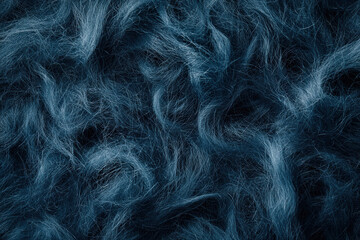 Obraz premium Soft blue wool fabric with textured, fluffy appearance, creating cozy and inviting feel. Ideal for textiles and fashion design
