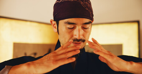 Aikido, face and meditation with man in dojo to practice martial arts or mindfulness. Balance,...