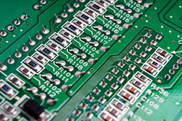 electronic circuit board with the back side, on which the soldering and connecting tracks of radio...