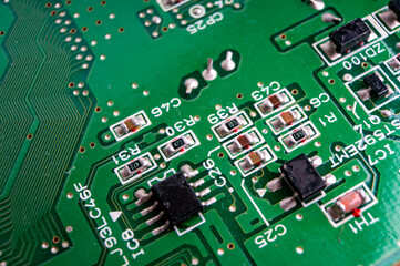 electronic circuit board with the back side, on which the soldering and connecting tracks of radio components are located