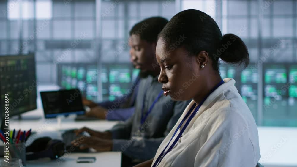 Poster african american data center technicians implement ai predictive maintenance systems. woman in serve