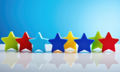 Fototapeta premium Colorful plastic stars arranged on reflective surface with blue gradient background