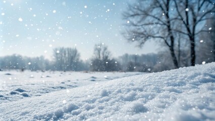 Obraz premium Snowflakes falling on a blanket of fresh powder, winter christmas background, frosty air