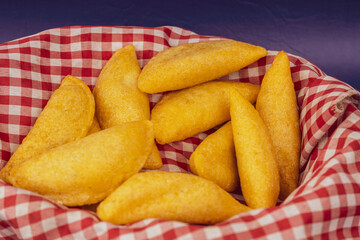 Delicious traditional Colombian empanadas with spicy sauce