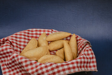 Delicious traditional Colombian empanadas with spicy sauce