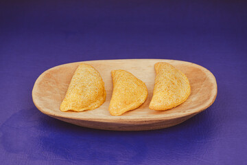 Delicious traditional Colombian empanadas with spicy sauce