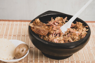 Typical lechona from Tolima with rice