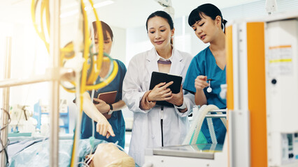Hospital, doctor and mannequin with healthcare mentor and nursing dummy for anatomy students....