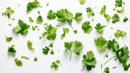 Chopped fresh parsley leaves scattered on a white background creating a vibrant culinary backdrop for recipes or food presentation