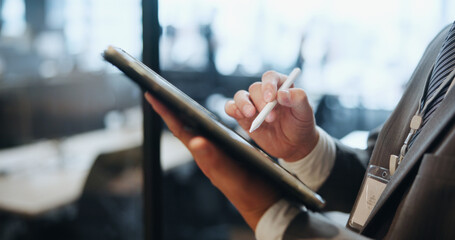Business, hands and man with tablet, stylus and typing with social media, network or digital...