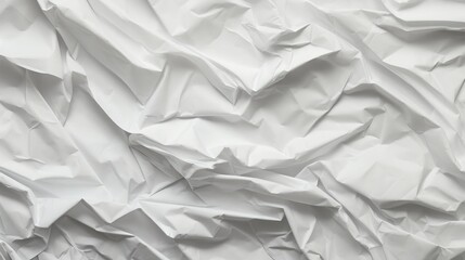 Obraz premium Crumpled texture of white paper background with soft shadows creating depth and visual interest for design and creative projects
