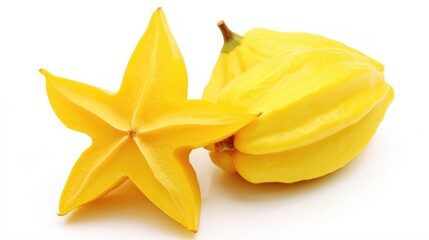 Fototapeta premium Fresh star fruit composition on a clean white background highlighting its unique shape and vibrant yellow color for food photography.
