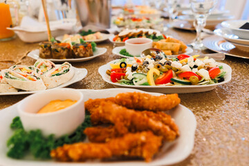 cold meats, vegetable salads, fruit salads Preparation of dishes for an all-inclusive banquet in a resort hotel. Empty all inclusive line, restaurant equipment, wedding food 