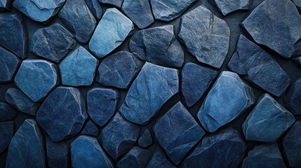 Interlocking formation of textured blue rocks displaying various shapes and shades of blue, creating a striking visual pattern.