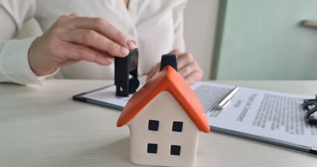 Documents deal with house with official seal