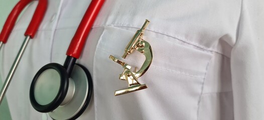 Doctor scientist biologist geneticist with stethoscope and microscope icon