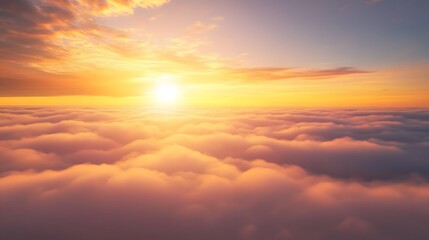 Fototapeta premium Golden Sunset Above a Sea of Clouds