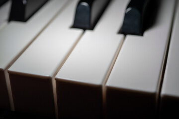 Jazz Piano Keys. Close-up of piano keys, focused on one note, with foreground and background fading...