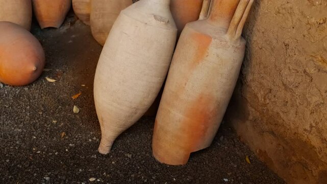 Amphorae at the stables courtyard of the House of Menander (Casa del Menandro), Pompeii, Naples, Campania, Italy, buried by Vesuvius in 79 AD