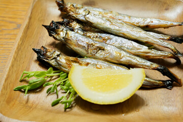 Shishamo ( grilled whole shishamo smelt fish), a home-style dish from Japan and other Asian regions	
