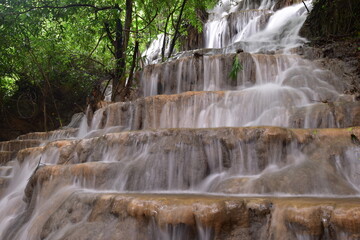 Travel to waterfalls during the rainy season, The tiers of the waterfall contrast beautifully with the sky, Nature itself is the best physician