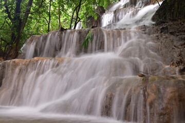 Travel to waterfalls during the rainy season, The tiers of the waterfall contrast beautifully with the sky, Nature itself is the best physician