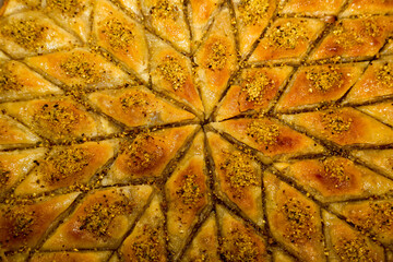 Baklava - a layered pastry dessert filled with chopped nuts, and sweetened with syrup or honey