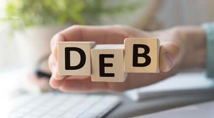 DEB acronym on wood block cubes on office table white green gradient background, Frequently asked questions, Business customer service and support concept