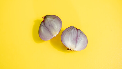 onion on a yellow background, onion for seasoning 