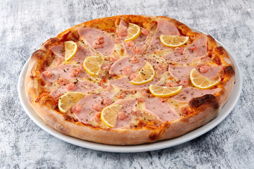 fresh pizza on the white plate