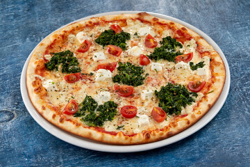 fresh pizza on the white plate