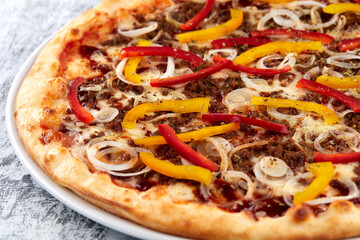 fresh pizza on the white plate