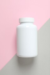 White bottle on a color background