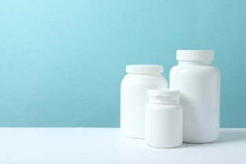 White bottles on a blue background