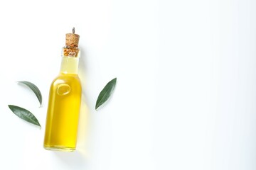 Bottle of fresh olive oil and olives with leaves on white background