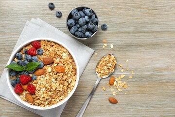 Delicious granola on a wooden background