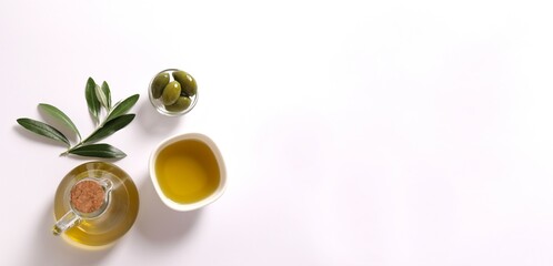 Olive oil in a bottle on a white background. Cooking oil and salad dressing