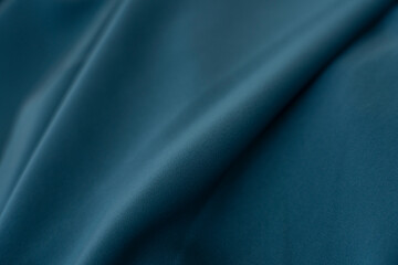 A piece of green fabric with a pattern