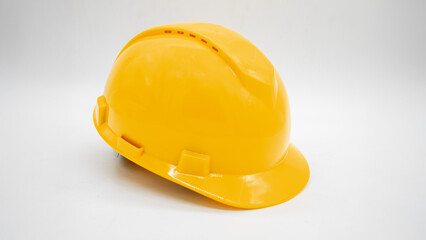 Fototapeta premium yellow safety helmet isolated on white