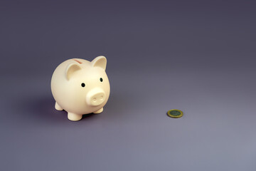 Opening the piggy bank on a dark purple background.. piggy bank, spilled gold coin. Waste of...