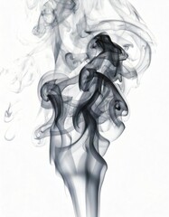 Fototapeta premium Abstract smoke patterns swirling gracefully against a white background.