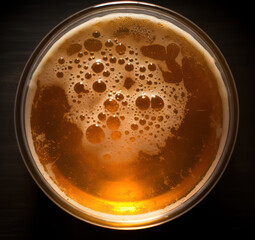 A Close-Up View of Golden Beer with Bubbles in a Glass, Showcasing Rich Color and Inviting Texture Against a Dark Background