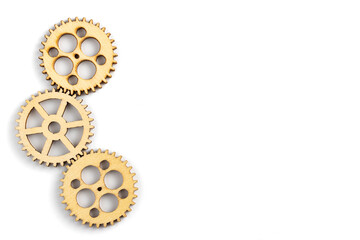 Wooden gear isolated on white background. empty space for copy space. concept of progress, workflow, automation, business process.