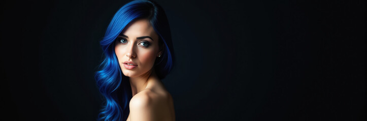 Fototapeta premium A portrait of a woman with blue hair
