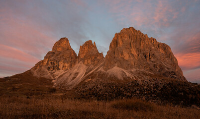 red sunrise alpenglow on the sassolungo mountains in the Italian Dolomites
