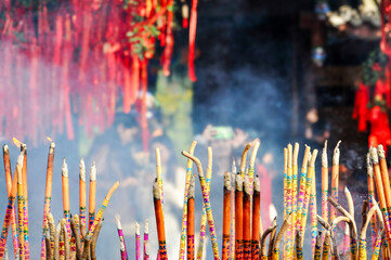 Burning incense in Chinese temple	